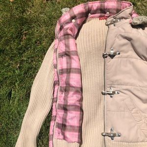 A stylish JJ basics coat with a snap off hood